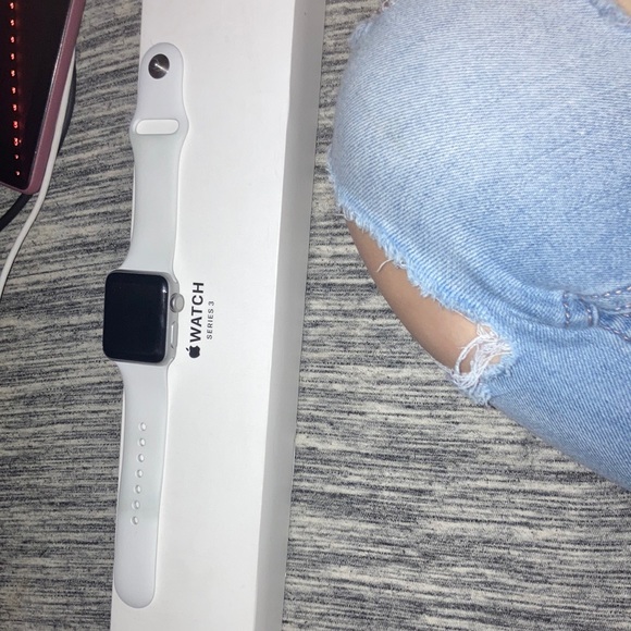 Apple Watch Series 3. I’ve only worn it like 2 times. Silver Aluminum white band
